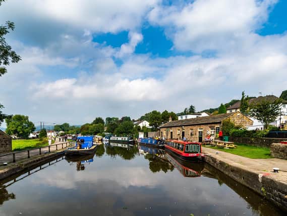 Canal boats on the Leeds Liverpool Canal above the Five-Rise Locks, Bingley. (James Hardisty).