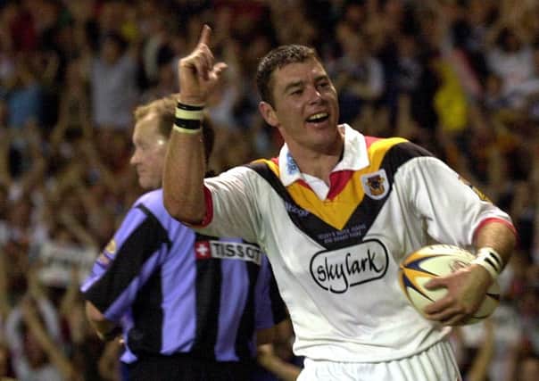 Hat-trick hero: Mick Withers celebrates scoring one of three tries he scored in an opening salvo by Bradford Bulls that blew Wigan Warriors away in the 2001 Grand Final. (Picture:Bruce Rollinson)