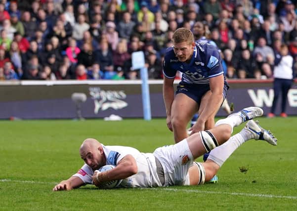 Exeter Chiefs’ Will Witty scores his side’s third try of the game at Sale on Sunday in the Premiership. The Chiefs won 25-15.   Picture: Martin Rickett/PA