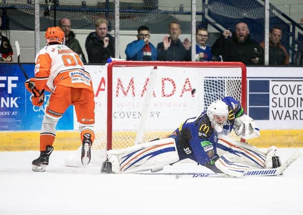 NICE JOB: Sheffield Steelers' John Armstrong scores the first of his two goals in the shootout against Coventry Blaze Picture: Scott Wiggins/EIHL.