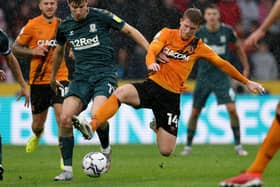 Hull City midfielder Andy Cannon (right) tussles with Middlesbrough rival Paddy McNair on Saturday. Picture: PA.