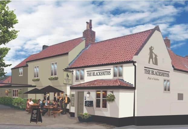 An artists' impression of how the new pub will look.