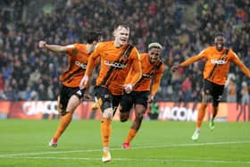 Hull City's Keane Lewis-Potter (centre) celebrates his goal against Middlesbrough, and his place in our Team of the Week (Picture: PA)