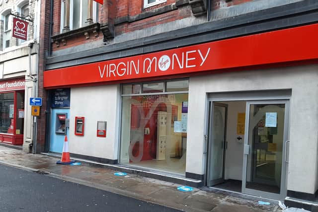 Virgin Money's branch closures continue to attract criticism.