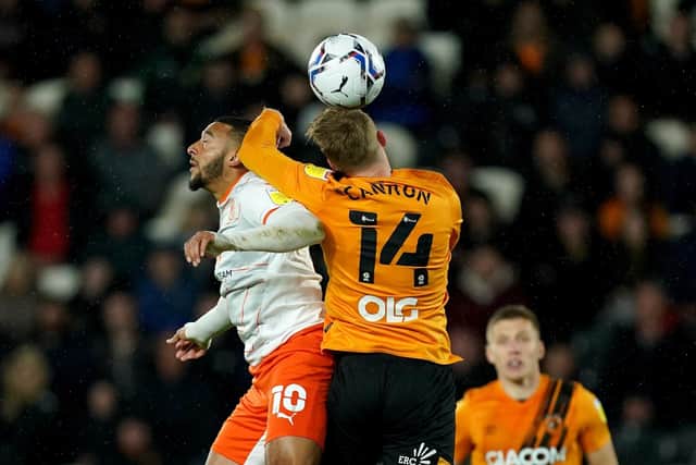 Blackpool's Keshi Anderson battles with Hull City's Andy Cannon (Picture: PA)