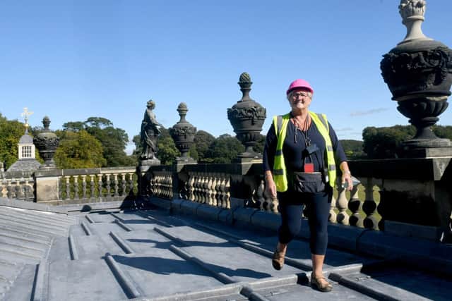 Julie Readman Facilities Manager at Wentworth Woodhouse walking by some of the restored balustrades on the roof which has been re-leaded Writer: Byline: Gary Longbottom
