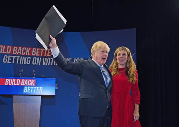 Boris Johnson and his wife Carrie after the Prime Minister addressed the Tory party conference.