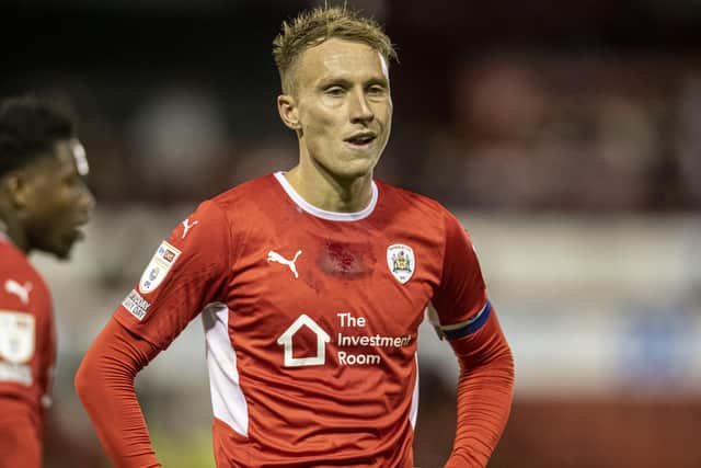 Cauley Woodrow: Barnsley captain had a confrontation with fans at Oakwell last weekend.
