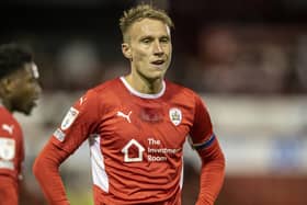 Cauley Woodrow: Barnsley captain had a confrontation with fans at Oakwell last weekend.