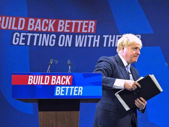 Prime Minister Boris Johnson delivers his keynote speech at the Conservative Party Conference in Manchester.(PA)