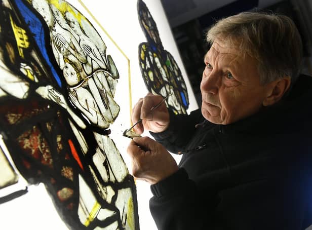 Keith Barley Director and Conservationist at Barley Studio's near York working on the third window from All Saints Church North Street, York, depicting St Peter greeting the good at the gates to heaven. Gary Longbottom