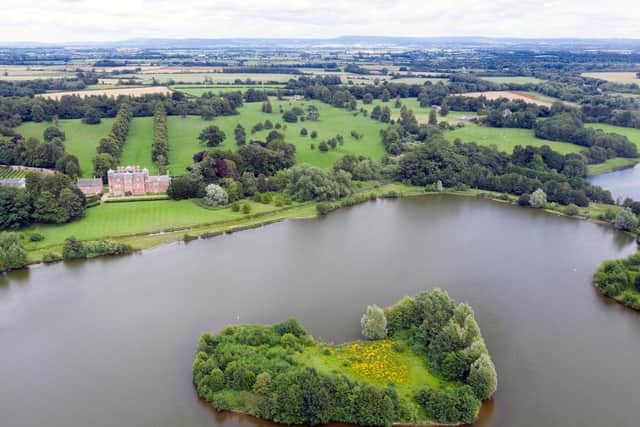 Kiplin Hall and Gardens photographed by @bigladderphotographer showing the lake zone in the foreground and the estate zone beyond the house and lime tree avenue.
