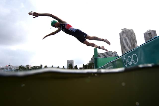 LEADING THE WAY: Jonny Brownlee dives during the Mixed Relay Triathlon at Tokyo 2020. Picture: Charly Triballeau/Getty Images.