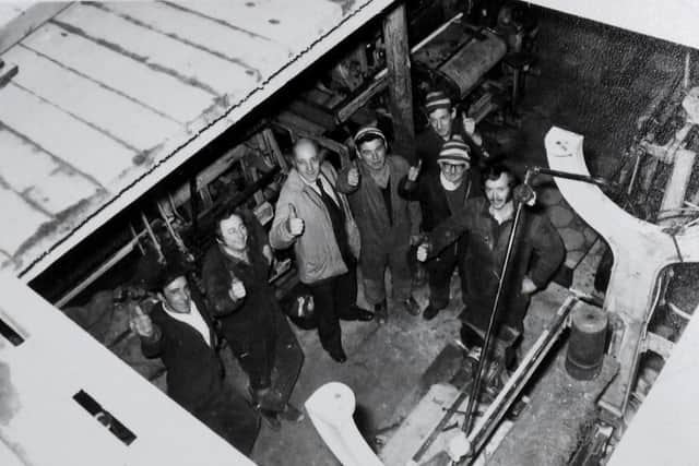 Avena's seven founding members at the Denholm premises in the mid-1970s.