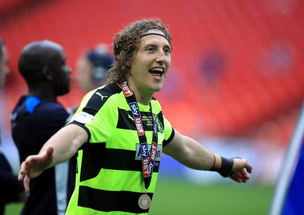 Huddersfield Town's Michael Hefele celebrates after winning the Sky Bet Championship play-off final at Wembley Stadium, London. (Picture: Mike Egerton/PA Wire)