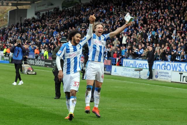 Terriers goal scorers Isaiah Brown and Michael Hefele celebrate the win at the end of the February 2017 game with Leeds (Picture: Tony Johnson)