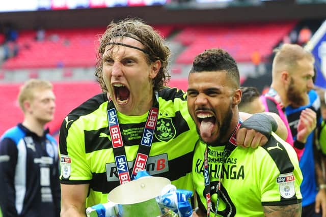 Huddersfield Town players Michael Hefele and Elias Kachunga celebrate being promoted. (Picture: Simon Hulme)
