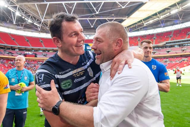 BRING IT ON: Featherstone's Brett Ferres & Paul March celebrate after their side's victory over York City Knights in the 1895 Cup Final at Wembley in July. Picture by Allan McKenzie/SWpix.com