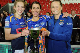 Caitlin Beevers, left, with captain Courtney Winfield-Hill and current coach Lois Forsell after Rhinos' 2019 Grand Final win. Picture by Steve Riding.