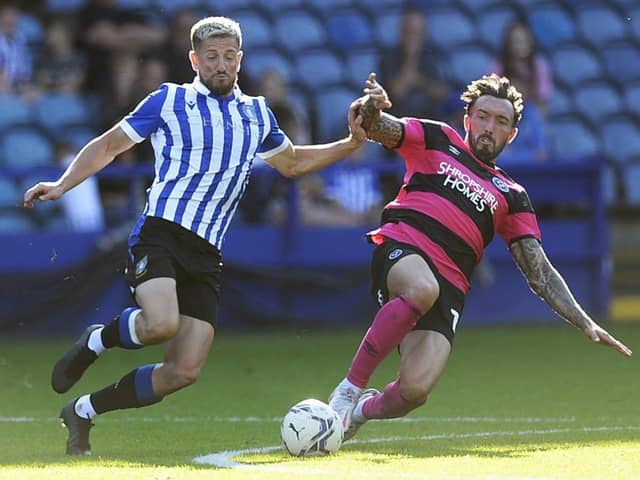 VERSATILE: Sam Hutchinson, pictured in action against Shrewsbury Town, can play in midfield or defence