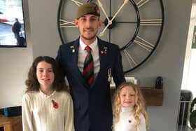Veteran Ben Bainbridge, with daughters Ellie and Ariel.