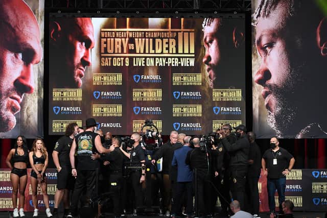 FACE-OFF: Between Tyson Fury and Deontay Wilder. Picture: Getty Images.