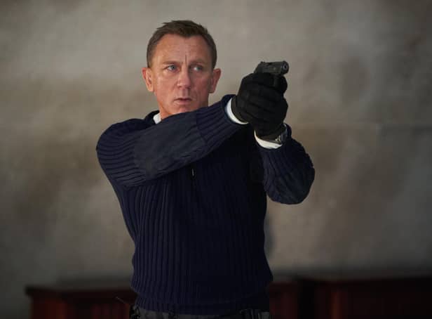 Daniel Craig playing James Bond for the final time in the new Bond film No Time To Die. (PA)