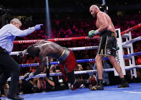 TELLING BLOW: Tyson Fury knocks out Deontay Wilder to win in the 11th round in Las Vegas Picture: AP/Chase Stevens