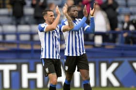Sheffield Wednesday's goalscorer Lee Gregory and central defender Dominic Iorfa salute the home fans at the final whistle. Picture: Steve Ellis