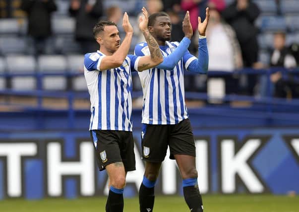 Sheffield Wednesday's goalscorer Lee Gregory and central defender Dominic Iorfa salute the home fans at the final whistle. Picture: Steve Ellis