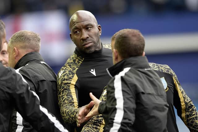 SATISFIED: Sheffield Wednresday boss Darren Moore shakes hands at the final whistle after his team's 1-0 win over Bolton Wanderers. Picture: Steve Ellis