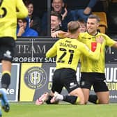 Harrogate Town's Jack Muldoon celebrates scoring his side's first goal Scunthorpe United on Saturday. 
Picture: Bruce Rollinson