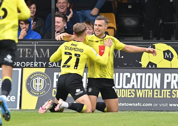 Harrogate Town's Jack Muldoon celebrates scoring his side's first goal Scunthorpe United on Saturday. 
Picture: Bruce Rollinson
