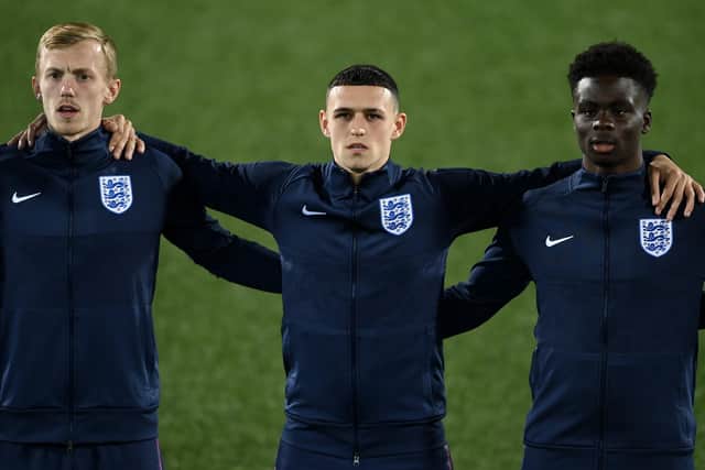 James Ward-Prowse, Phil Foden and Bukayo Saka of England line up for the national anthem in Andorra. (Photo by David Ramos/Getty Images)