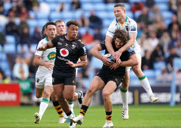 Wasps' Mike Le Bourgeois tackled by Northampton Saints' Fraser Dingwall during their Gallagher Premiership match on Sunday. Wasps won 26-20. Picture: PA