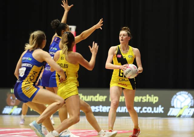 NEW SIGNING: Leeds Rhinos Netball's new signing Rebekah Airey, with ball, in action against the Rhinos for Manchester Thunder earlier this season. Picture: Morgan Harlow/Getty Images.
