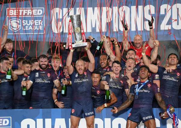 St Helens' James Roby lifts the Betfred Super League Grand Final trophy at Old Trafford. Picture: PA