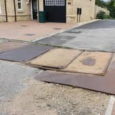 Robbie Moore, MP for Keighley and Ilkley, said the state of the road on The Banks estate in Silsden is "appalling"