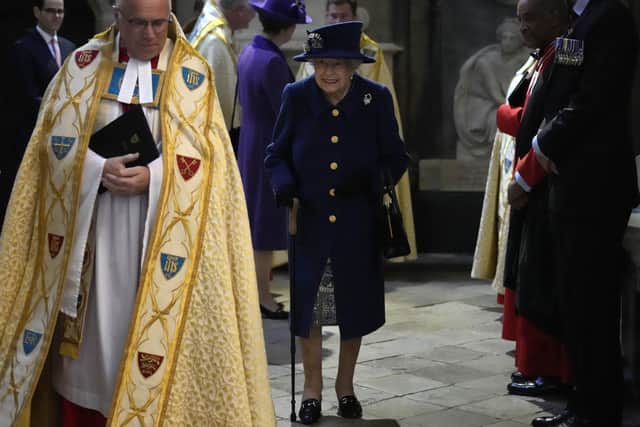 In a rare sight that showed her age, the 95-year-old monarch entered the Abbey on a walking stick.
Photo: Getty
