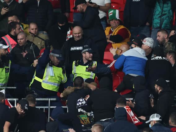 CLASHES: Hungary supporters clashed with police inside Wembley. Picture: Getty Images.