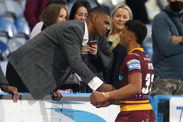 Huddersfield Giants' Will Pryce with his father, former player Leon Pryce, after the game. Picture: Ed Sykes/SWpix.com