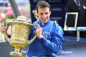 William Buick celebrates the  King George VI And Queen Elizabeth Stakes of Adayar who now lines up in the Qipco Champion Stakes.