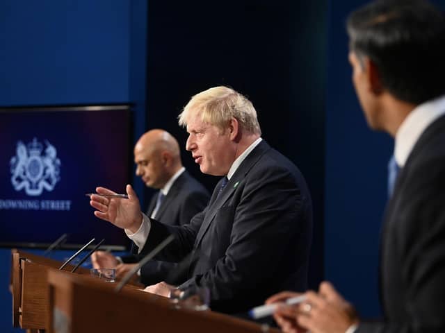 Health Secretary Sajid Javid, Prime Minister Boris Johnson and Chancellor of the Exchequer Rishi Sunak, during a media briefing in Downing Street, London, on the long-awaited plan to fix the broken social care system. Picture: Toby Melville/PA Wire.