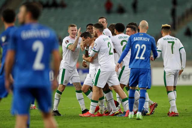 GOAL: Republic of Ireland team-mates celebrate with Chiedozie Ogbene after his first international goal