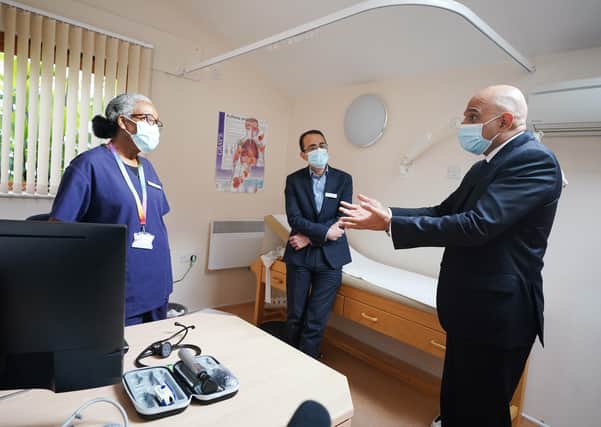 Health Secretary Sajid Javid meeting Dr Clementine Olenga-Disashi (left) and Dr Ali al-Bassam, during a visit to the Vale Medical Centre in Forest Hill, south east London, following the announcement of the blueprint for improving access to GP appointments and supporting GPs and their teams.