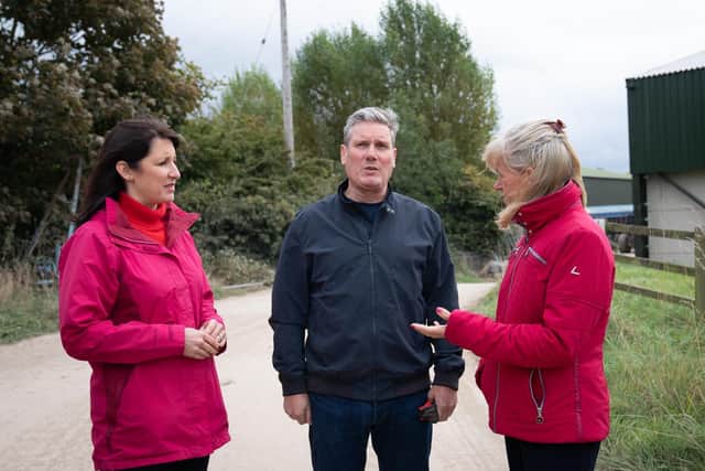 Labour leader Sir Keir Starmer (centre) and shadow chancellor Rachel Reeves (left) chat with National Farmers Union president, Minette Batters (right) at Manor Farm in Kelfield, Yorkshire where they discussed supply chain issues with local farmers.