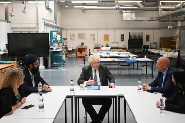 Boris Johnson during a visit to Kirklees College - but is he doing enough to prioritise schools and skills? Former Education Secretary Justine Greening thinks so.