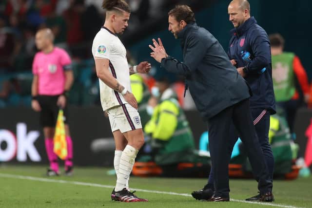 Gareth Southgate, Head Coach of England gives instructions to Leeds United's Kalvin Phillips of England during the UEFA Euro 2020 Championship Final between Italy and England at Wembley Stadium on July 11, 2021 in London, England. (Photo by Carl Recine - Pool/Getty Images).