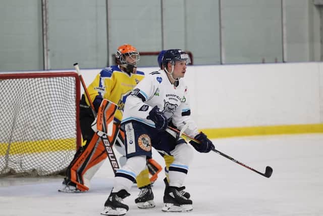 NAthan Salem jostles for position in front of the Leeds Knights' net on Friday night. Picture: Peter Best.