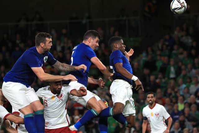 Going for goal: Republic of Ireland's Shane Duffy, John Egan and Chiedozie Ogbene jump for a header during the international friendly against Qatar. Picture: Donall Farmer/PA Wire.